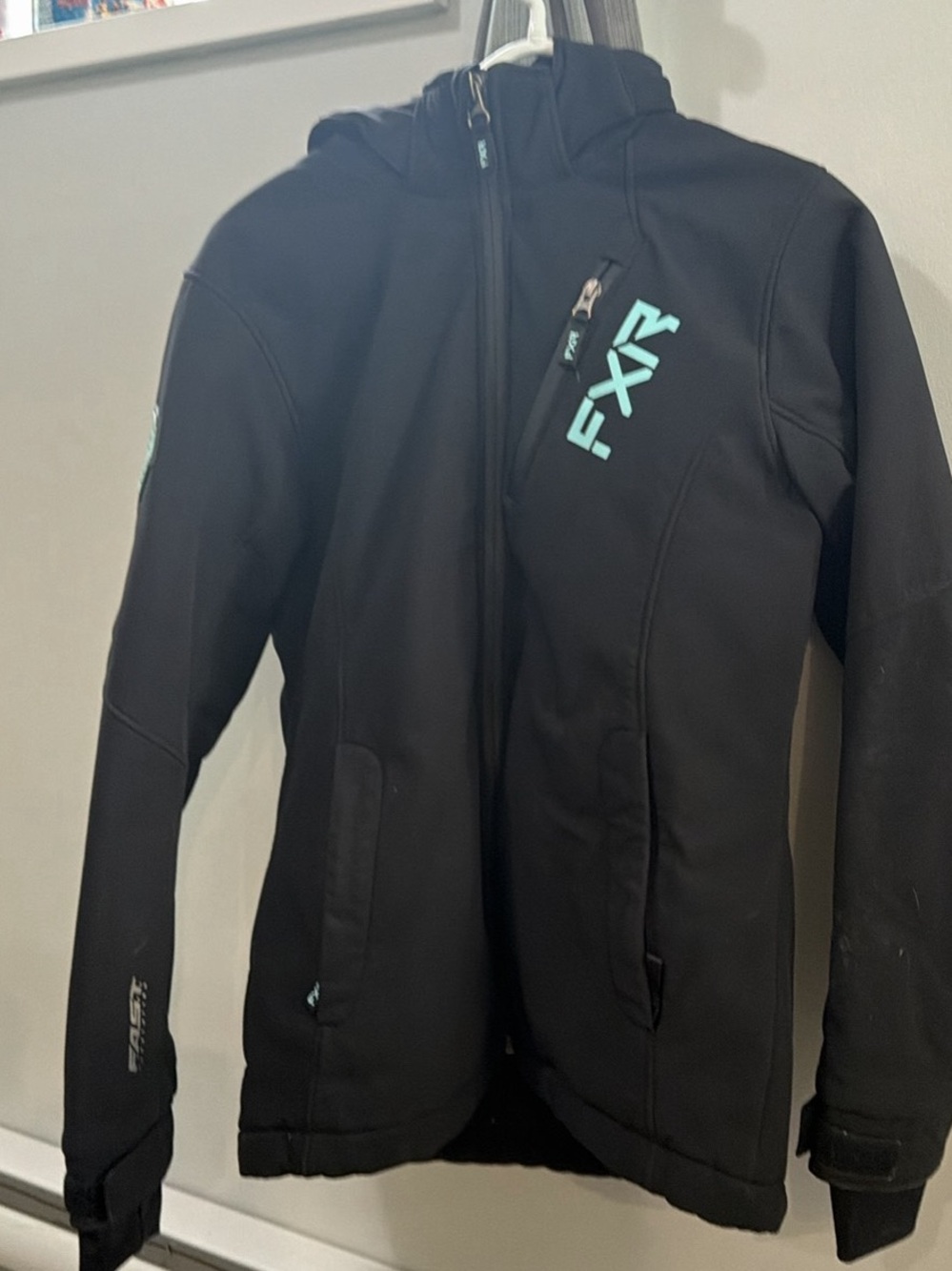 FXR Women's Black Puffer Jacket with Teal Logo